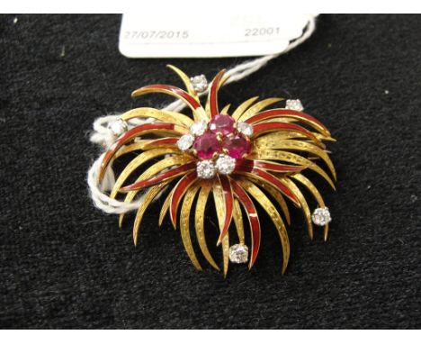 An 18ct Ruby, Diamond and Enamel Floral Brooch:
a high quality ruby and diamond brooch with enamelled red leaves and plain en