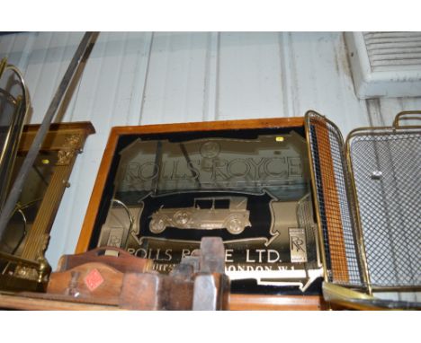 A Rolls Royce advertising mirror contained in maple frame 