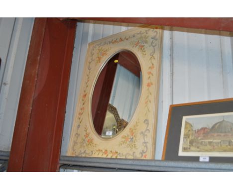 A floral decorated wall mirror 