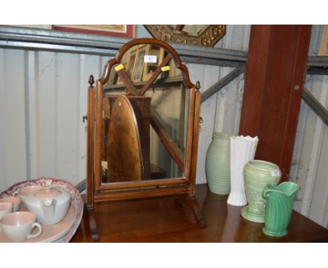 A mahogany swing frame mirror 