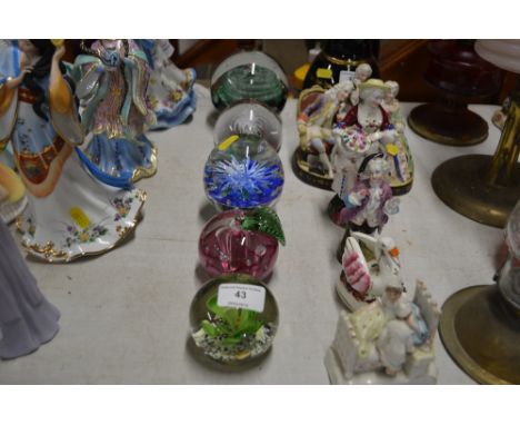 Five various glass paperweights to include a Caithness example 