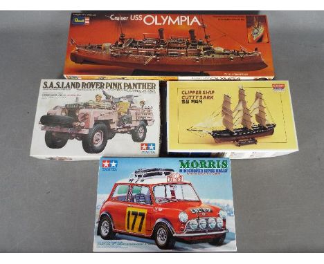 Tamiya, Revell, Academy - Four boxed plastic model kits in various scales. Lot includes Tamiya #2448 1:24 Morris Mini Cooper 