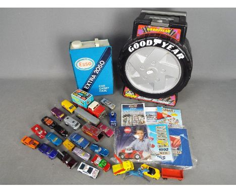 Matchbox - Hot Wheels - Majorette - A collection of 2 car carry cases, 24 loose play worn vehicles and 10 catalogues. Include