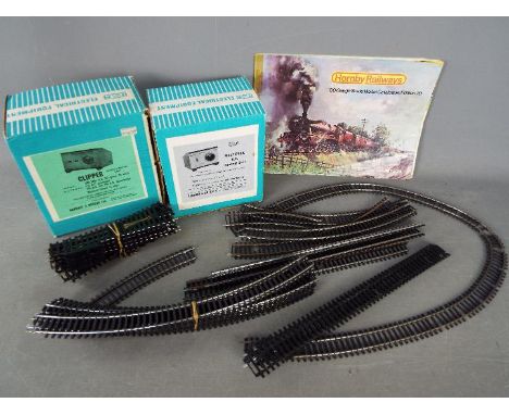 Hornby, Hammant &amp; Morgan - A small quantity of OO gAuge model railway track with two boxed Hammant &amp; Morgan controlle