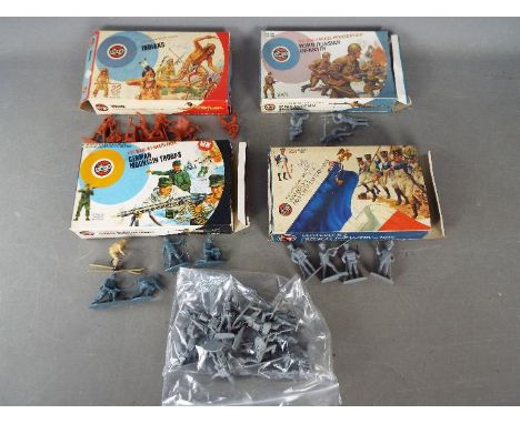 Airfix - Four boxes of 1;32 scale plastic soldiers from Airfix with a quantity of unboxed Airfix 1:32 soldiers. Lot includes 