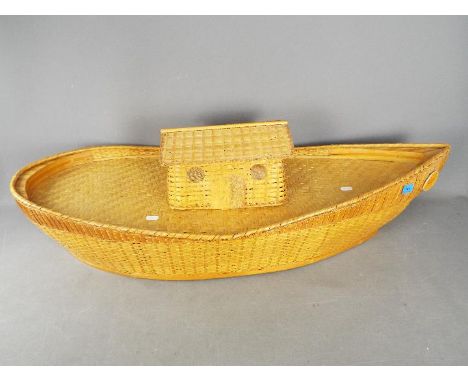 Steiff - Wicker Noah's Ark by Steiff, it measures 99 cm long and has a lift off cabin. It appears in Near Mint condition.
