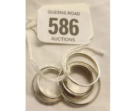 SIX VARIOUS SILVER RINGS 