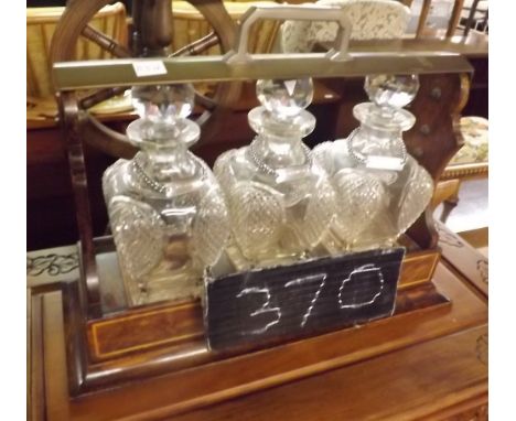 UNUSUAL EDWARDIAN TANTALUS WITH 3 MATCHING DECANTERS &amp; SPIRIT LABELS