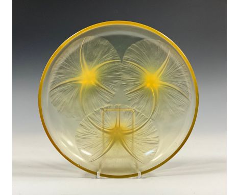 An R Lalique Volubilis pattern opalescent glass bowl, in yellow/amber tones, 21.5 cm diameter, with moulded signature, model 