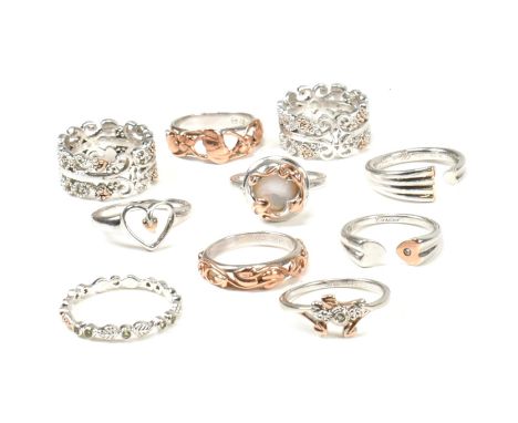 A collection of ten Clogau silver and Welsh rose gold rings. The ten rings to include heart cross over rings, Tree of Life ri