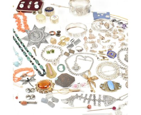 A large collection of silver and costume jewellery. The jewellery to include three silver engraved hinged bangles, two hallma