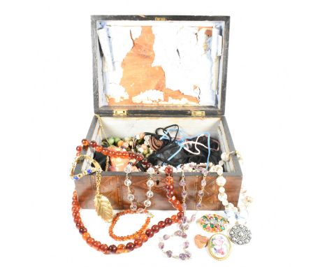 A large collection of costume jewellery. The lot to include an amber beaded necklace together with an amber beaded bracelet w