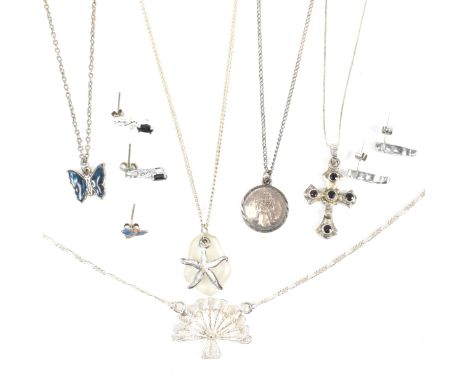 A collection of silver pendant necklaces and earrings. The lot to include five silver pendant necklaces, two pairs of silver 