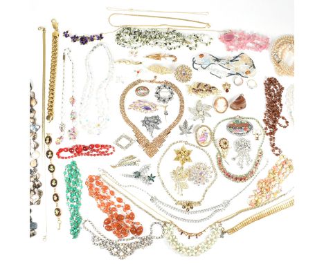 A large collection of costume jewellery. The lot to include beaded necklaces, gold tone metal necklace chains, snake chains, 