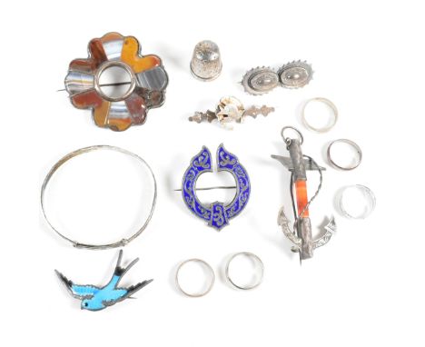 A collection of silver jewellery. The jewellery to include a hallmarked silver engraved bangle, hallmarked for Birmingham, 19