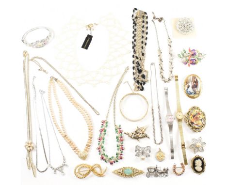 A collection of rolled gold and costume jewellery. The jewellery to include an 18ct rolled gold engraved hinged bangle, a sta