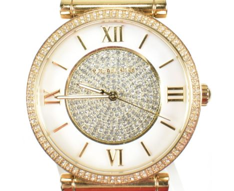 A Michael Kors Catlin ladies wristwatch. The Michael Kors wristwatch having a mother of pearl and gem set dial with mixed sti