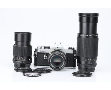 A Pentax MX SLR Camera Outfit, chrome, with Pentax-M f/1.7 50mm, Pentax-M f/3.5 135mm and Pentax-M Zoom f/4.5 80-200mm lenses