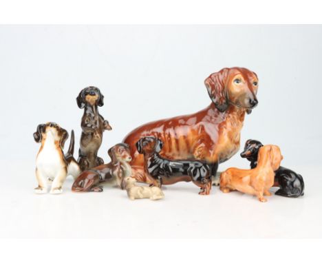 A Small Collection of Ceramic Dachshunds, various factories including two large Goebeld examples, as well as Coopercraft, Lom