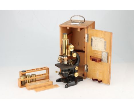 A Leitz Brass &amp; Black Lacquer Compound Microscope, German, c.1910, signed to the bodytube 'Ernst Leitz, Wetzlar, No.19763