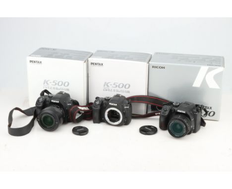 Three Pentax Digital SLR Cameras, to include a Pentax K-70, with an SMC Pentax-DAL 18-50mm f/4-5.6 lens, a Pentax K-50, with 