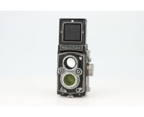 A Rollei Rolleiflex Automat Medium Format TLR Camera, black, body G, shutter working, with Zeiss Tessar 75mm f/3.5 lens, opti