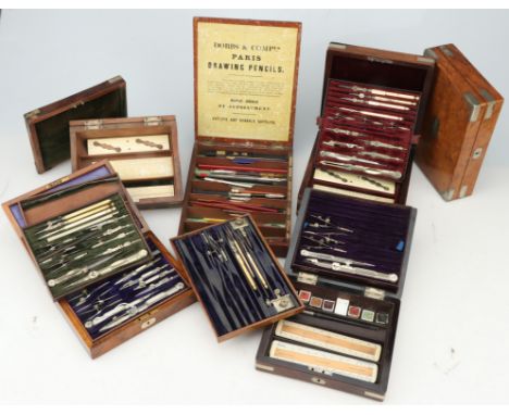 Five Sets of Drawing Instruments etc., set by Reynolds in figured walnut case, ivory protractor and scale rule/protractor in 