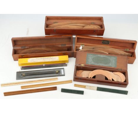 Drawing Instruments, four mahogany cases of railway curves and smaller curves, one by Halden, one by Stanley, with a brass ro