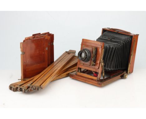 A Thornton Pickard Imperial Tripple Extension Half Plate Camera, mahogany &amp; brass, body P-VG, camera VG until recently dr