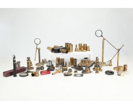 Collection of Microscope Accessories, including objectives, eyepieces, bulls-eye condensers on stands, a microtome, a binocul