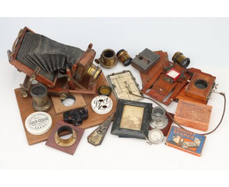 A Selection of Early Mahogany &amp; Brass Camera Accessories, including a quarter plate mahogany camera, brass lenses, bee me