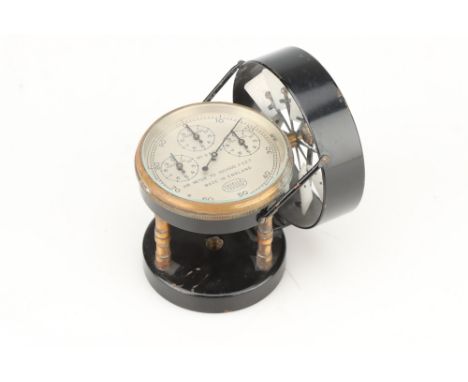 An Anemometer or Air Meter by Casella, c.1940, with three subsiduary dials, in leather case, instrument 9cm high