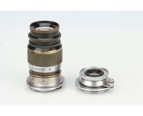 A Leitz Elmar f/3.5 35mm Lens, chrome, seral no. 643916, body, F, elements, F, internal haze and marks, together with a Leitz