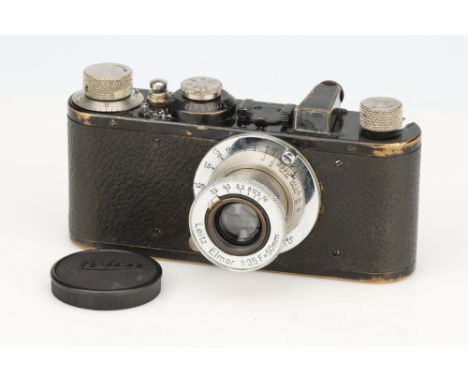A Leica Ic Camera, black, serial no. 62753, with Leitz Elmar f/3.5 50mm lens, body, F, shutter working, lens, G, cleaning mar