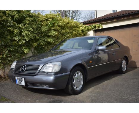 A 1995 Mercedes-Benz S500 W140 coupé , registration number M830 BNO, metallic grey.The W140 S class saloons and coupés were t