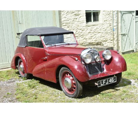 A 1949 Morgan 4/4 drophead coupé, registration number LFJ 46, chassis number 1912, engine number Q595E, maroon.Morgan records