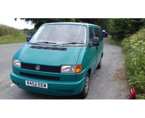 A 1997 Volkswagen Day Van 1000 TD camper conversion, R452 EEW, chassis number WB2ZZZZ70ZWH060273, green. This practical campe