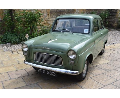 A 1958 Ford Anglia 100E, registration number VFO 682, chassis number TC/609/AD, engine number 100E/665078, green. The all new