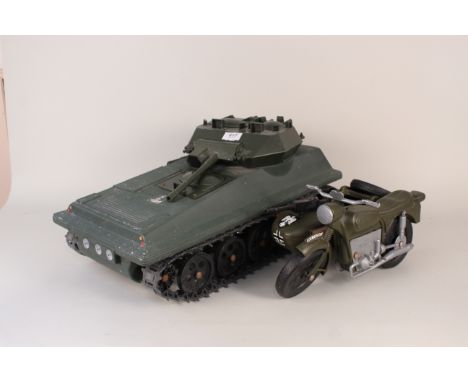 An Action Man toy tank and motorcycle