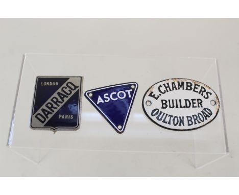 Three enamel badges including 'Darracq' and 'Ascot'