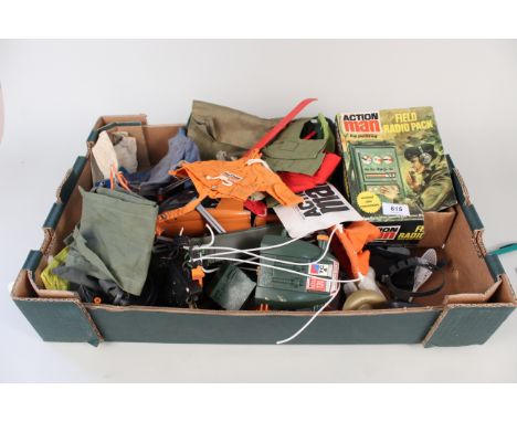 A collection of Action Man accessories including clothes, weapons, a boxed field radio etc