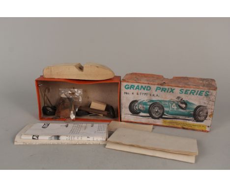A boxed vintage racing car model kit
