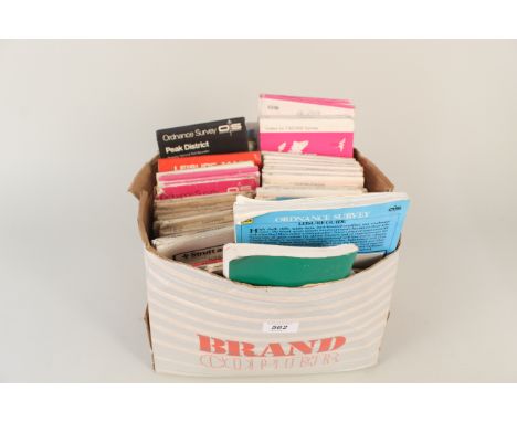 A box containing a quantity of vintage ordnance survey maps