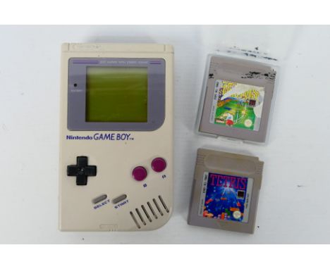 Nintendo - Game Boy. A loose, original game Boy #DGM01 1989. I can confirm it is working on batteries (not included). Tetris 