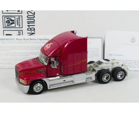 Franklin Mint - A boxed 1:32 scale Franklin Mint Limited Edition Mack Elite CL613 diecast model truck. The truck shows dusty 