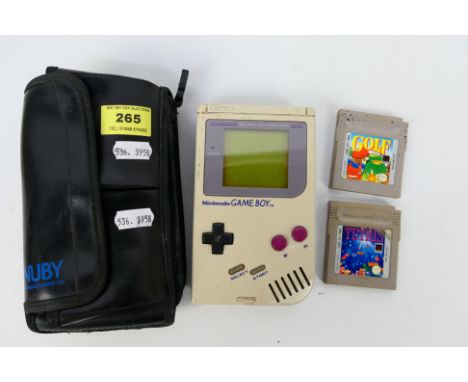 Nintendo - Game Boy. A loose, original game Boy #DGM01 1989 in NUBY case. I can confirm it is working on batteries (not inclu