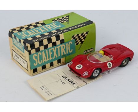 Scalextric - Exin - A boxed Ferrari GT 330 # C.41 # 4041. This Spanish made model appears in Very Good condition with light s