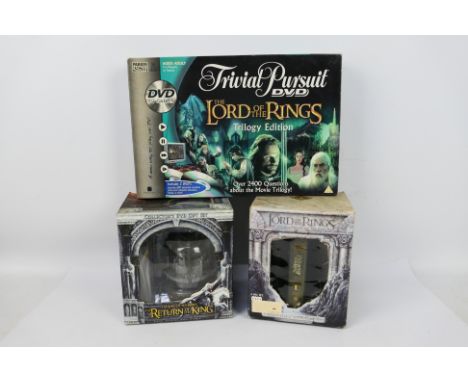 The Lord of the Rings - DVD Box Sets - Trivial Pursuit DVD Trilogy Edition. A selection of Three boxed items appearing in Exc