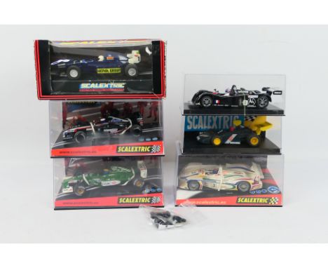Scalextric - 6 x boxed slot cars including Cadillac LM, Audi R8 Le Mans, Minardi F1, Jaguar F1 and similar others. The models
