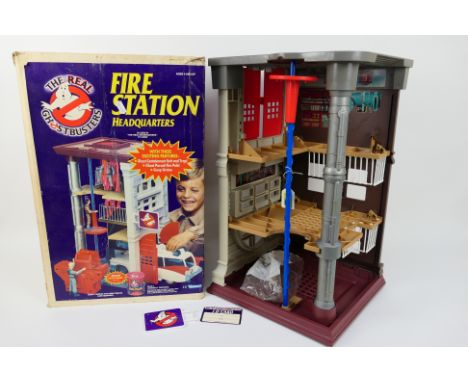 Kenner - A boxed Kenner 'The Real Ghostbusters' Fire Station Headquarters. The set comes with working pole, an extra pole, si